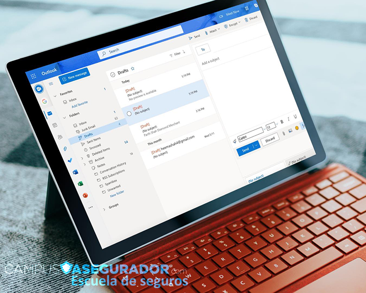 Tablet Surface Pro con teclado rojo mostrando bandeja de borradores en Microsoft Outlook para gestión profesional.