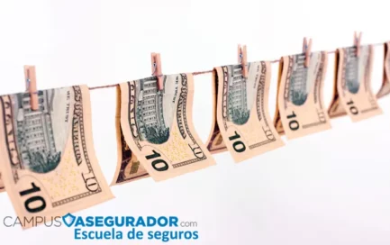 Billetes de diez dólares en tendedero con pinzas de madera. Concepto de prevención de blanqueo de capitales para seguros.
