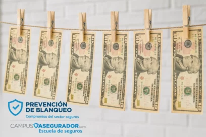 Billetes de diez dólares colgados en tendedero con pinzas, concepto de prevención de blanqueo para sector seguros.