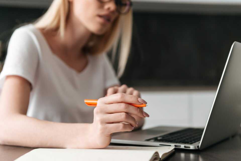 cropped photo young businesswoman working with laptop home